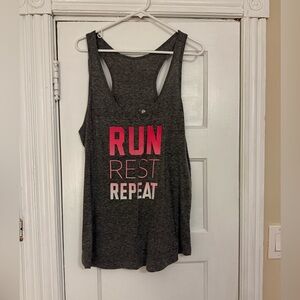 Gray Sleeveless Top with Pink Text